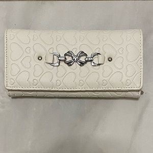 White faux leather wallet